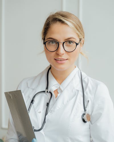 Portrait of a family dentist in a modern clinic setting