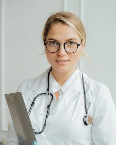Portrait of a family dentist in a modern clinic setting